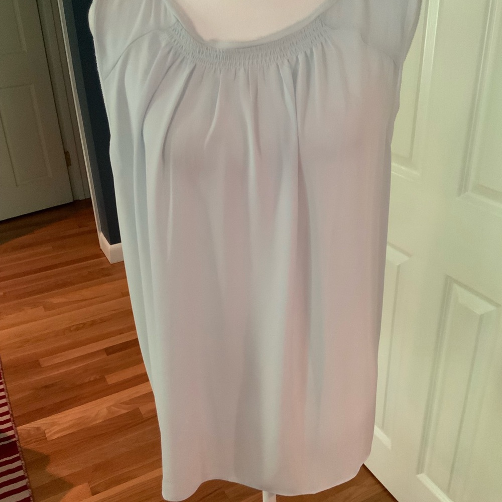 White Sleeveless Blouse